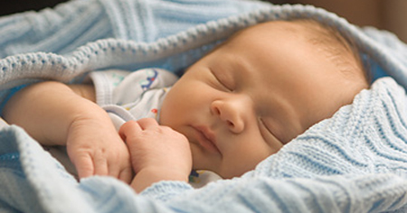 Baby (0-6 months) sleeping, close-up