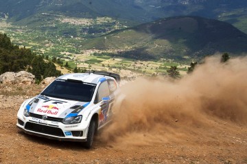 epa03726324 Sebastien Ogier of France drives his Volkswagen Polo R WRC during the Acropolis Rally 2013 as part of the World Rally Championship (WRC) in Loutraki, Greece, 01 June 2013.  EPA/-